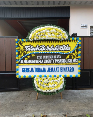 Papan Bunga Duka di Pulo Berayan Kota